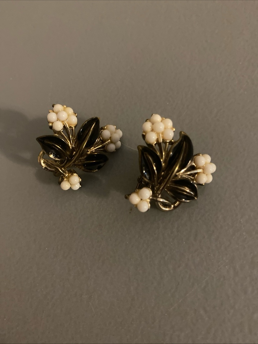 Vintage Coro black enamel leaf and flower earrings clip on